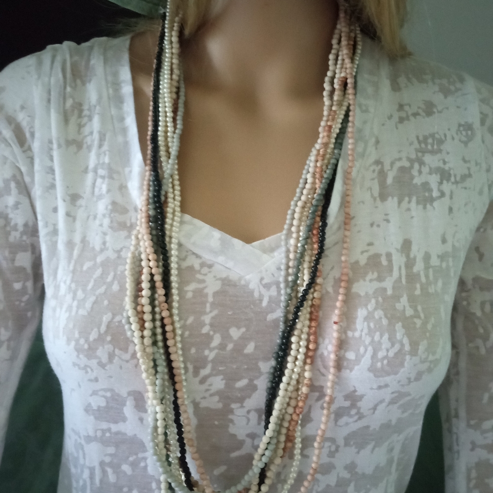 Multi layered, colored beads. Over the head.